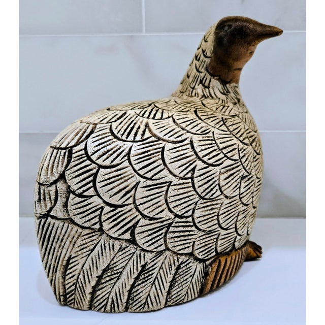 Charming vintage hand-carved teak wood partridge figurine from Thailand, featuring deeply incised feather details and warm...