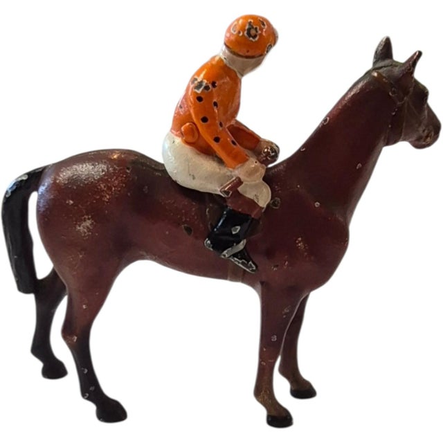 Vintage 1931 Hubley Cast Iron Jockey & Race Horse measures 4.75" high and 5.25 inches wide.
