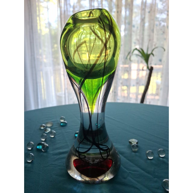 For sale is a gorgeous, hand blown art glass vase, designed in 1957 by Viktor Berndt for Flygsfors’ . Of an asymmetrical...