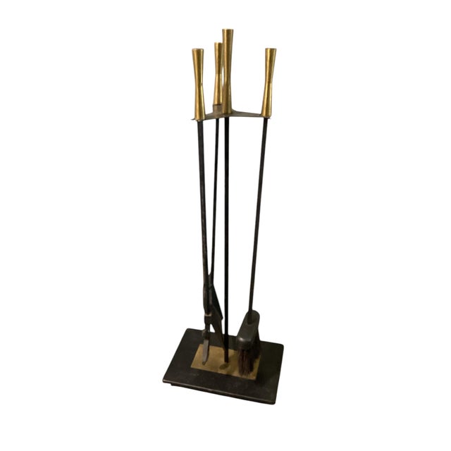 Set of Mid Century Modernist Brass and Iron Fireplace Tools in the style of Paul McCobb. The set consists of a brush,...