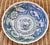This is a an original Japanese Arita stoneware bowl. Rich blue colorscenes of bamboo, cherry blossoms, pagodas and other...