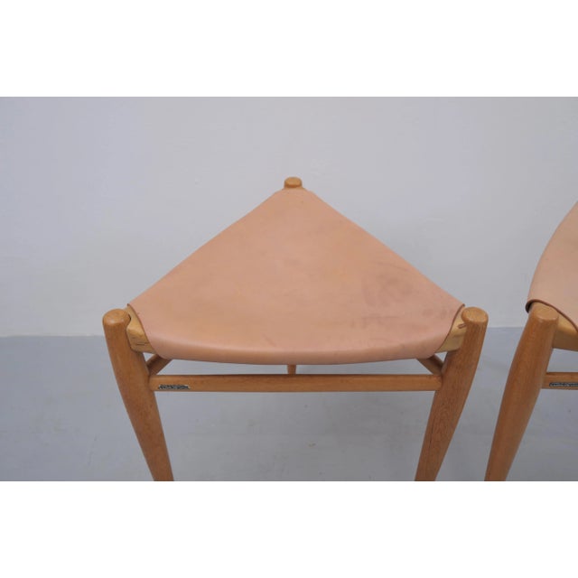 Three-legged stool from the 1950s, designed by Uno & Östen Kristiansson for Luxus Vittsjö, Sweden. Luxus Vittsjö was a...