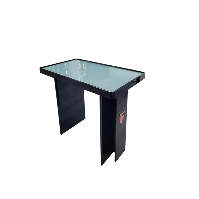 A striking pair of Postmodern accent tables that embody the clean lines and bold material contrasts of 1980s design....