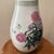 This large Qing Dynasty Famille Rose hand painted peonies vase with calligraphy is a stunning piece of antique porcelain...
