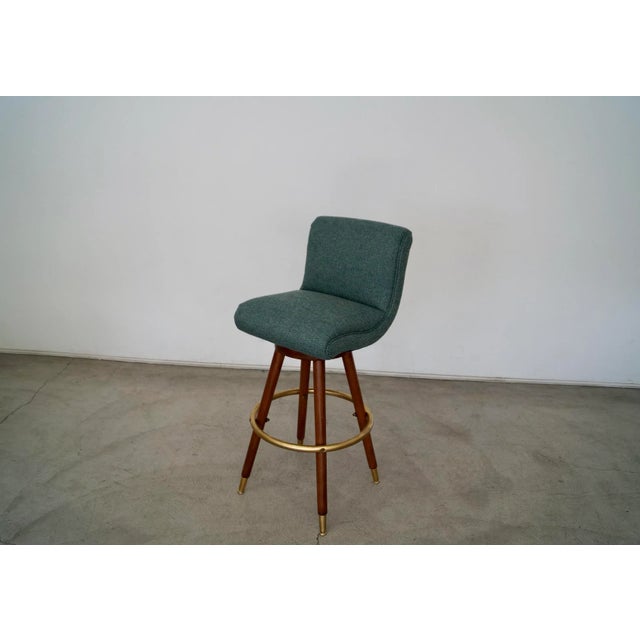 Vintage Mid-century Modern barstool for sale. Made in the 1960's, and has been professionally restored. It has been...