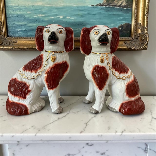 Bring timeless English country charm to your home with this delightful pair of vintage Staffordshire Ware spaniel dogs,...