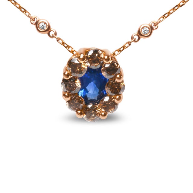 Contemporary 18K Rose Gold 5/8 Cttw White and Brown Diamond Accent and 7 x 4mm Oval Blue Sapphire Gemstone Statement Halo Cluster Pendant Necklace For Sale - Image 3 of 6