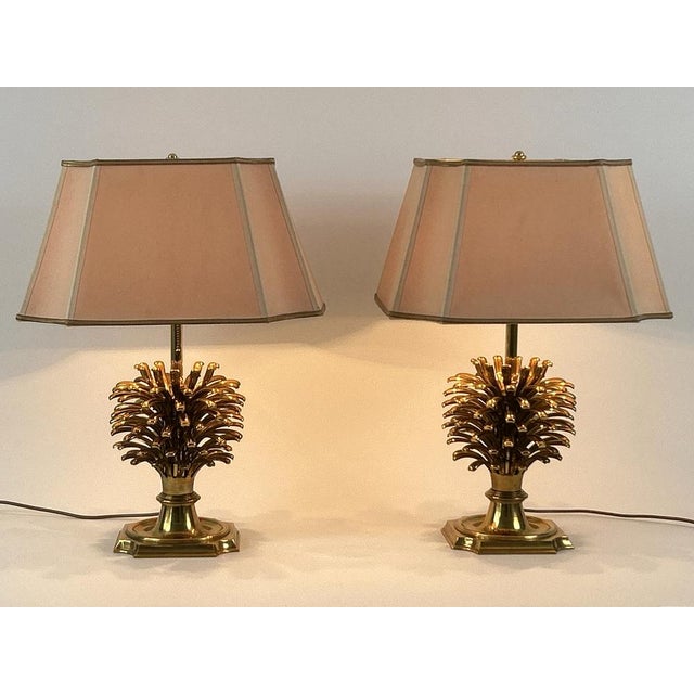Set of two monumental & extremely rare pine cone table lamps in heavy, solid brass. Designed and manufactured by feese,...