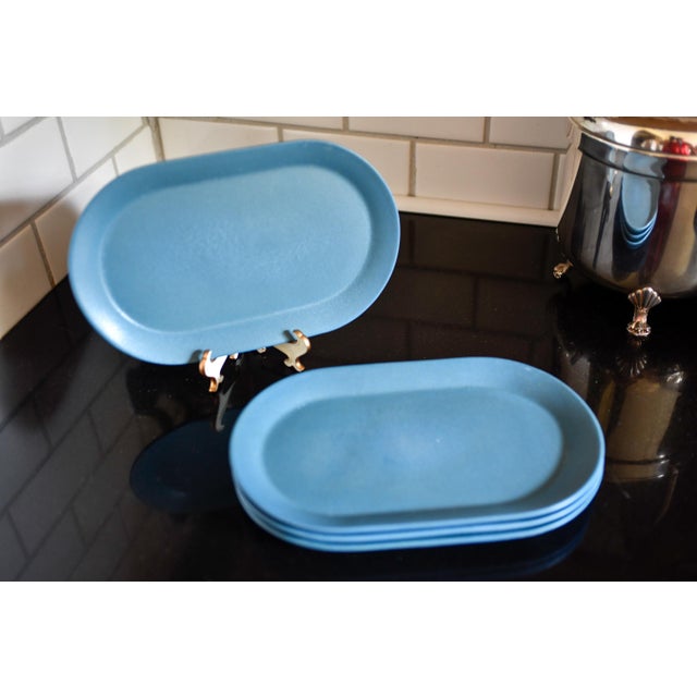 lovely set of four matching Bennington Potters oval plates in the classic blue glaze, stamped "Bennington Potters,...