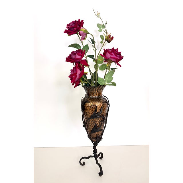 An important and rare vase in hand-hammered copper and wrought iron, attributable to Alessandro Mazzuccotelli. The base...