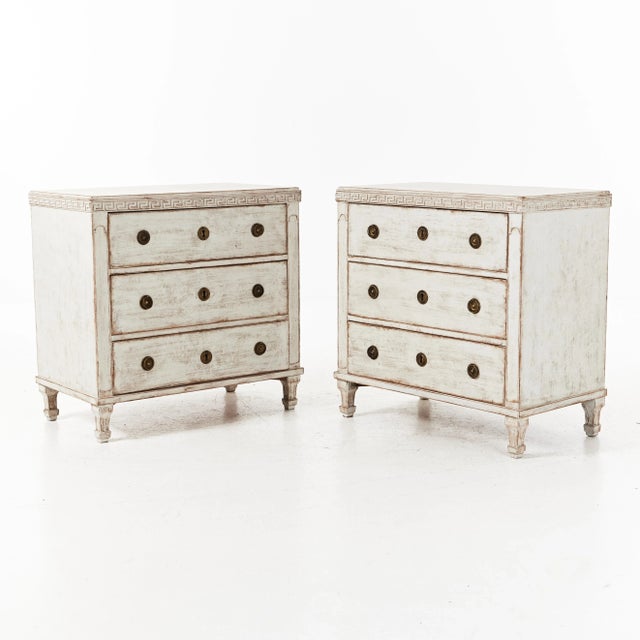 A pair of Gustavian twin chests of drawers from the second half of the 19th century. Tapered and fluted legs, three...