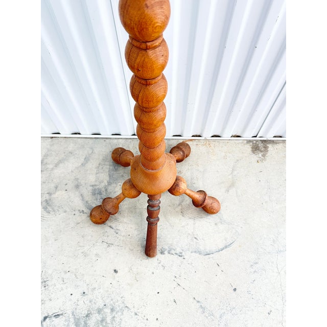 Lovely antique turned wood coat rack. Made of solid wood. Traditionally referred to as a "hall tree" or "coat tree" and...