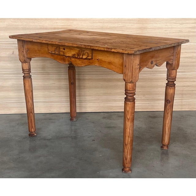 Spanish Country side table with drawer. Made of antique pine called "mobila", this table is very functional and you can...