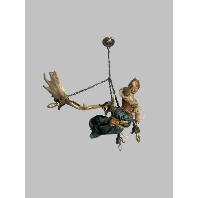 Antique Lusterweibchen chandelier (often called a bar maiden or forest maiden antler chandelier), originating from...