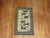 An early 20th century Chinese pictorial horses rug. Six blue horses flocking on a ivory colored ground. 2'2" x 3'9"