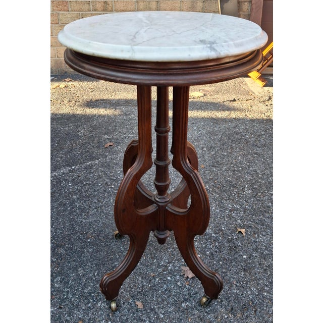Late 19th Century Eastlake Style Walnut and Marble Tip Oval Rolling Side Table For Sale In Washington DC - Image 6 of 8