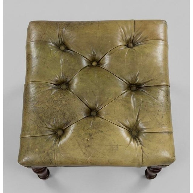 Chesterfield footstool ottoman in a handsome green leather with beautiful dark walnut tapered legs. Great for extra...