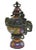 This is a traditional oriental Chinese incense burner made of metal and covered with yellow purple multi-color enamel...