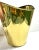 A polished English brass wastebasket or cachepot with a softly tapered silhouette, lightly hammered interior, and classic...