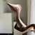 Traditional Indonesian Decorative Wooden Bird on a Base with a Crest and Rounded Wings For Sale - Image 3 of 16