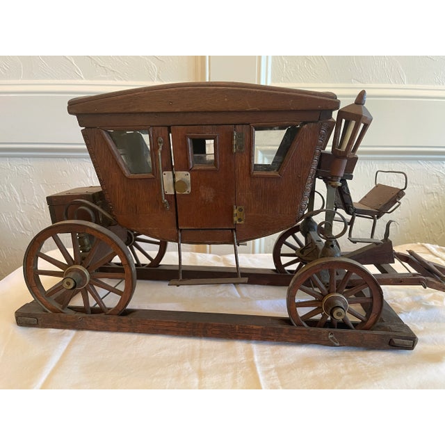 Folk art vintage stage coach. Details a plenty. Only thing missing is a horse. Doors, storage compartments and faux...
