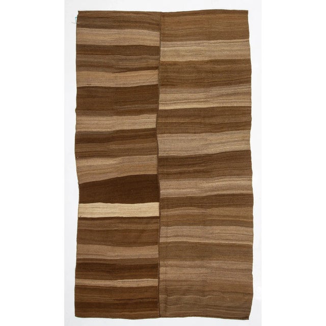 Handwoven vintage modern kilim rug from Kars region of Turkey. Approximately 50-60 years old. In very good condition