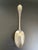 An antique tablespoon/serving spoon in the Lily pattern by 1847 Rogers Bros. This Aesthetic Movement design features...