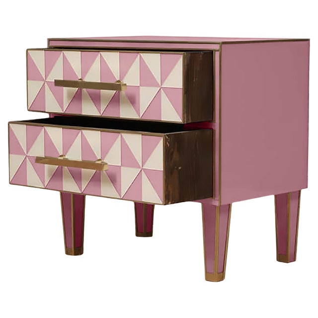 This pair of Italian bedside tables presents a striking optical effect, mixing pink and white Murano glass with elegant...
