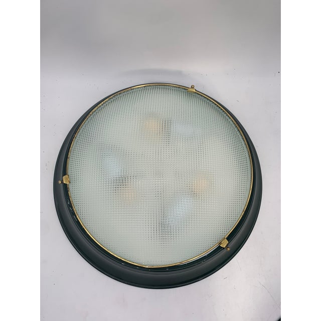 Lamps attributed to Fontana Arte. Sold as a pair. Ceiling or wall lamp, featuring a simple and functional design typical...