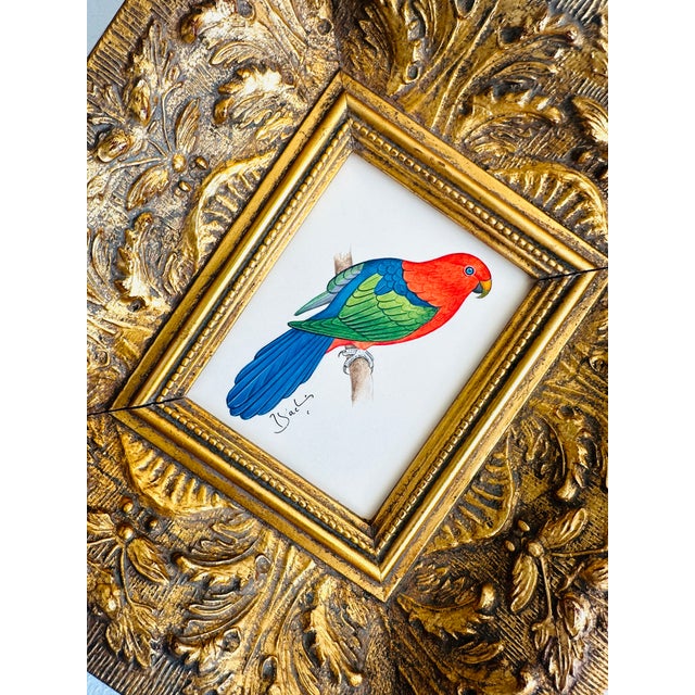 This hand-painted parrot is all about joyful color-play — fiery coral-reds, vivid emerald greens, rich cobalt blues, and...
