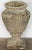 A fine English garden urn vase or planter pot of composition stone from the early 20th century - featuring a flared...