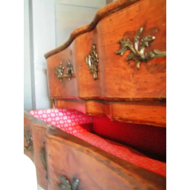 Gorgeous Louis XV Pantolinier from Arles, France. Has flowered red cloth liner in both drawers. Hardware in tact and...