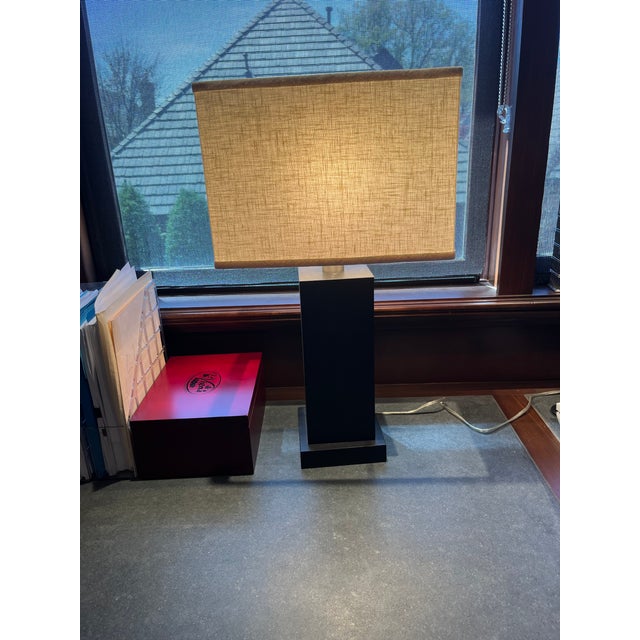This is a pair of vintage lamps from about 2001. They are contemporary with clean modern lines. They are in great working...
