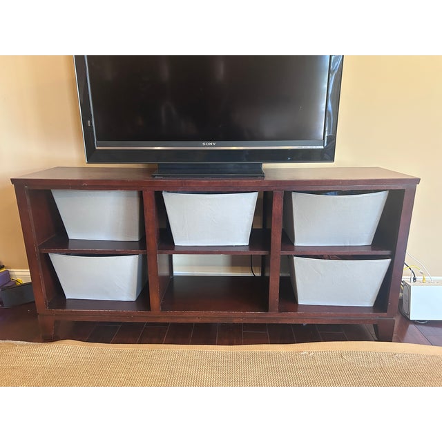 Crafted by Ethan Allen, this solid wood open media console combines timeless design with everyday functionality. Finished...