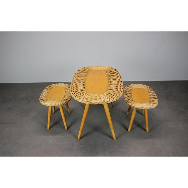 Vintage seating set manufactured by ULUV in Czechoslovakia during the 1960s. The set includes one table and two matching...