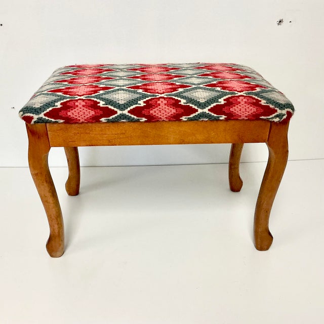 This is a beautiful Folk Art Needlepoint Stool Bench. It features a geometric design in reds and grays. The yarn...