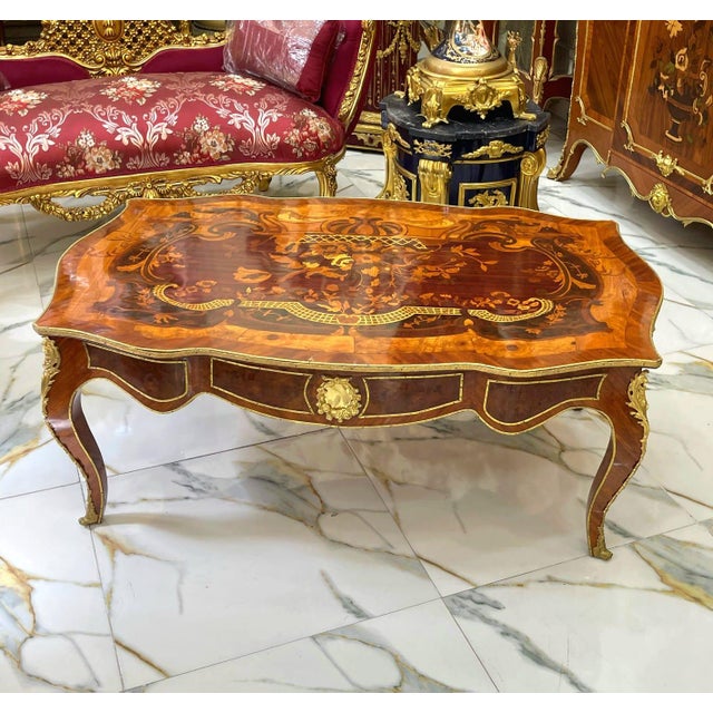 Create memories in a space that reflects your personality. This beautiful French-style coffee table features a rich...