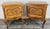 A beautiful pair of vintage French Louis-style bedside tables , crafted from solid oak with ornate carved detailing and...