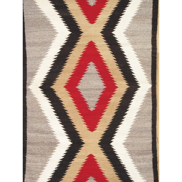 Rhythm of the Four Directions: A Mid-20th Century Navajo Chevron Rug, Handmade For Sale - Image 4 of 18