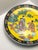 A large Japanese export 15" Chinoiserie-style porcelain charger plate, crafted in Japan around the 1930s. Stamped to its...