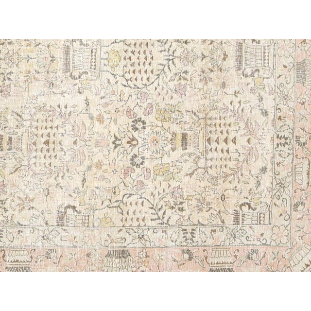 This Semi Antique Persian Tabriz Rug boasts a generous size of 8'3" x 10'6", making it the perfect centerpiece for any...