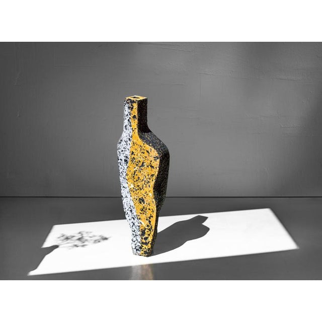 Fragment ochre ii sculptural vase by donatas zukauskas. Dimensions: w 19 x d 8.5 x h 64.5 cm. Materials: handcrafted...