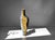 Fragment ochre ii sculptural vase by donatas zukauskas. Dimensions: w 19 x d 8.5 x h 64.5 cm. Materials: handcrafted...