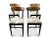 A set of four Thonet bentwood dining chairs that have been fully restored. The vintage bistro chairs feature a walnut...