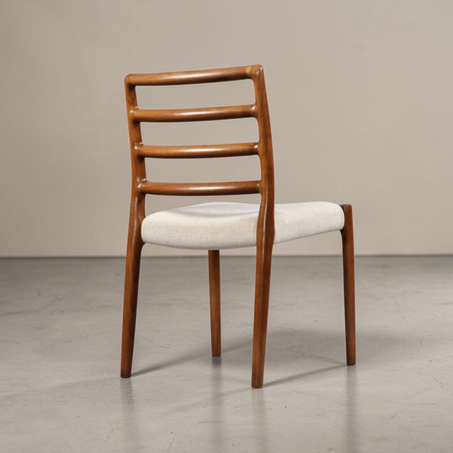 An outstanding set of six authentic J.L. Møller Model 85 dining chairs, crafted in Denmark in the late 1960s to early...