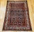 Discover the exquisite artistry and authentic craftsmanship of this magnificent Early 20th Century Vintage Persian Malayer...