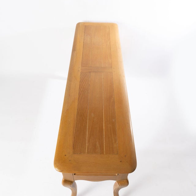 Oak Country French Style Sideboard with floral carving. Solid construction with dovetailed drawers, brass hardware, and...