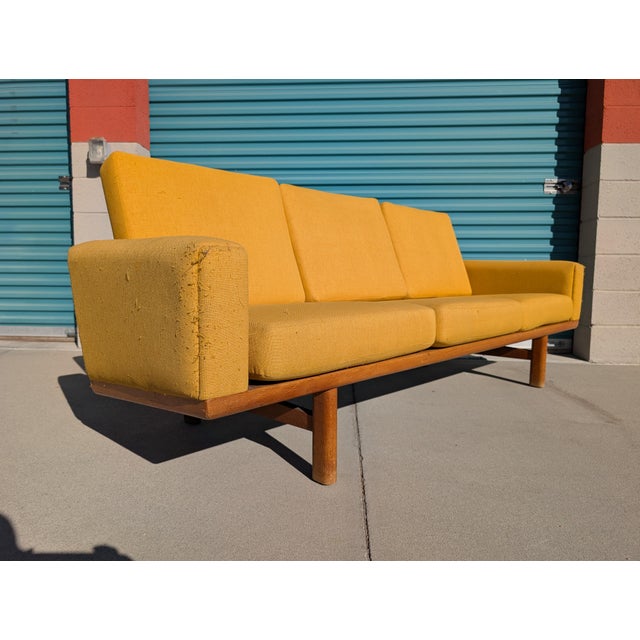 A striking vintage example of Hans Wegner’s GE-236 sofa, produced by GETAMA in Denmark circa 1960s. This beautifully...