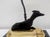 The Chelsea House Whippet (or Greyhound) Bookcase Lamp is a vintage mid-century figural lamp featuring a patinated bronze...