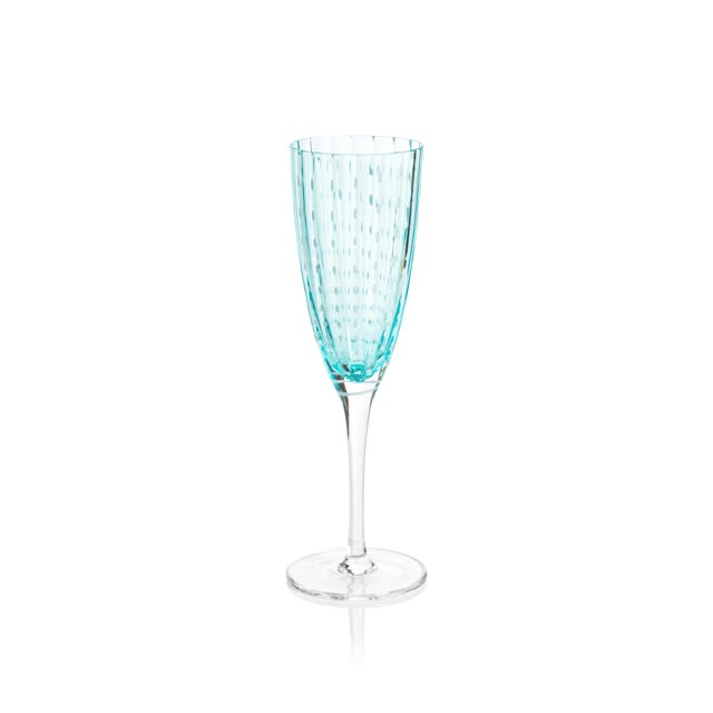 The Portofino Aqua Blue Champagne Flutes - Set of 6 Elevate your table setting with this stunning blue glassware...